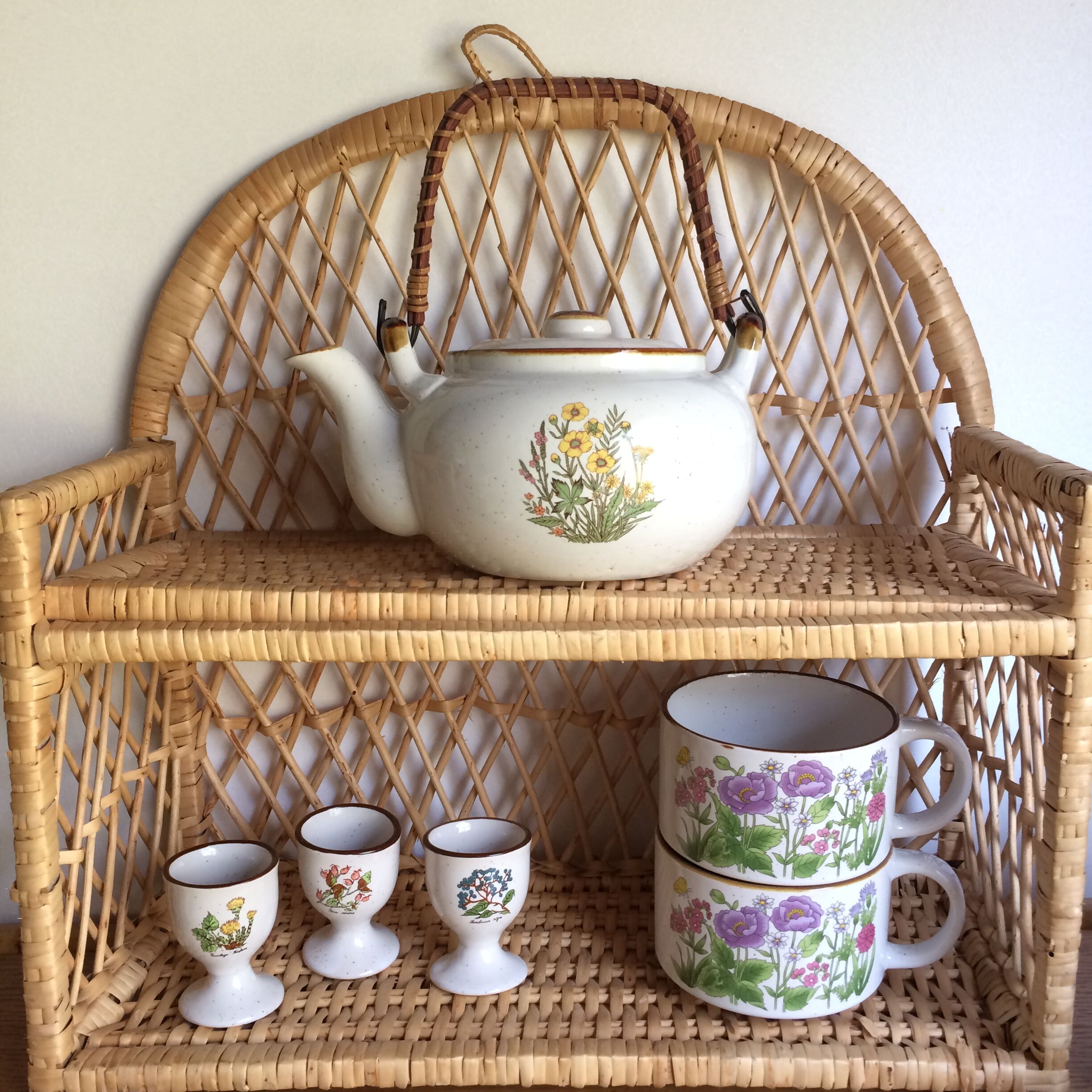 Vintage sandstone cups with flowers
