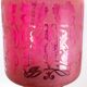 Antique pendant of pink opaline glass with brass edge and suspension from around 1860
