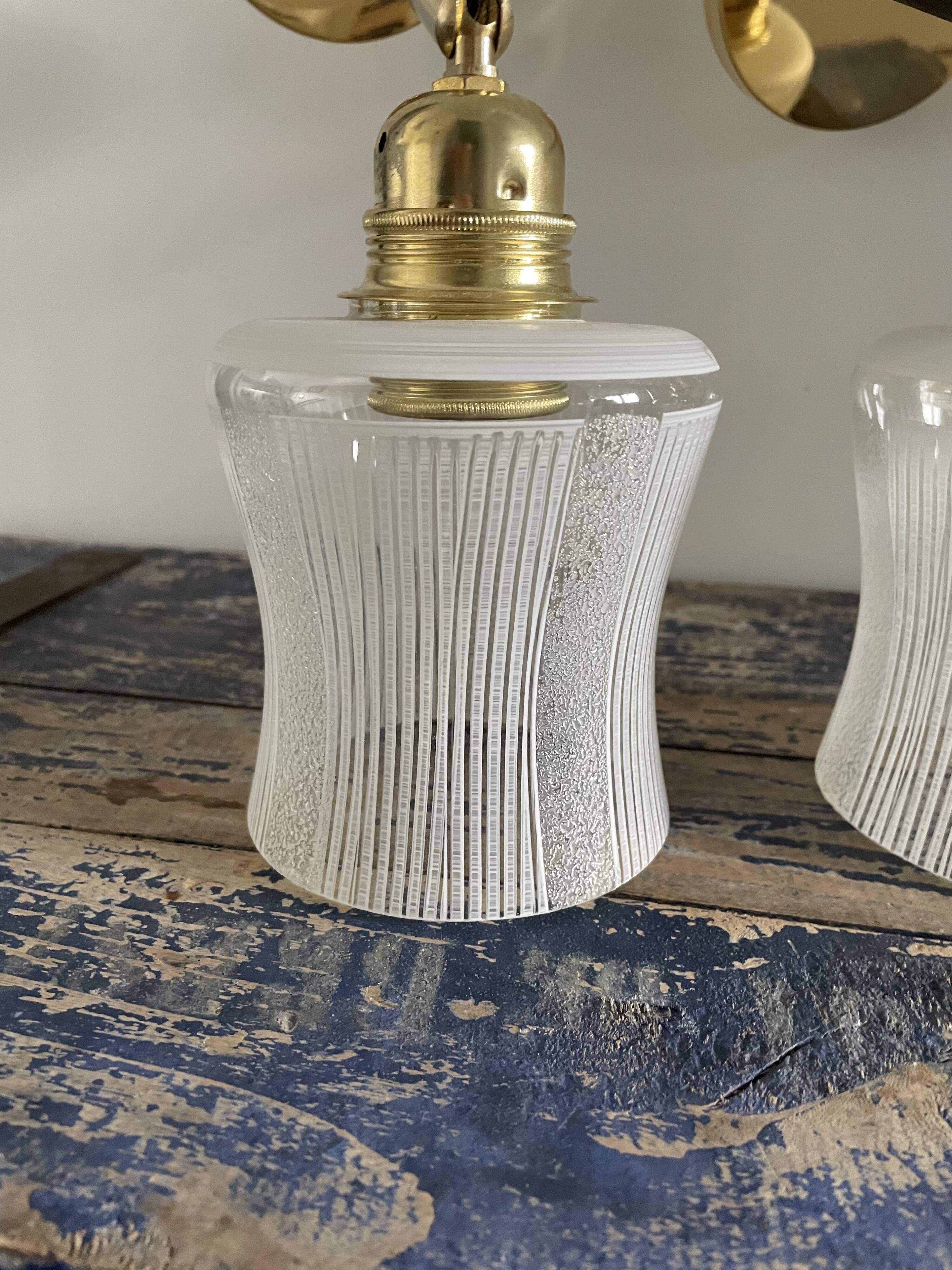 Pair of vintage wall lamps in electrified glass to nine