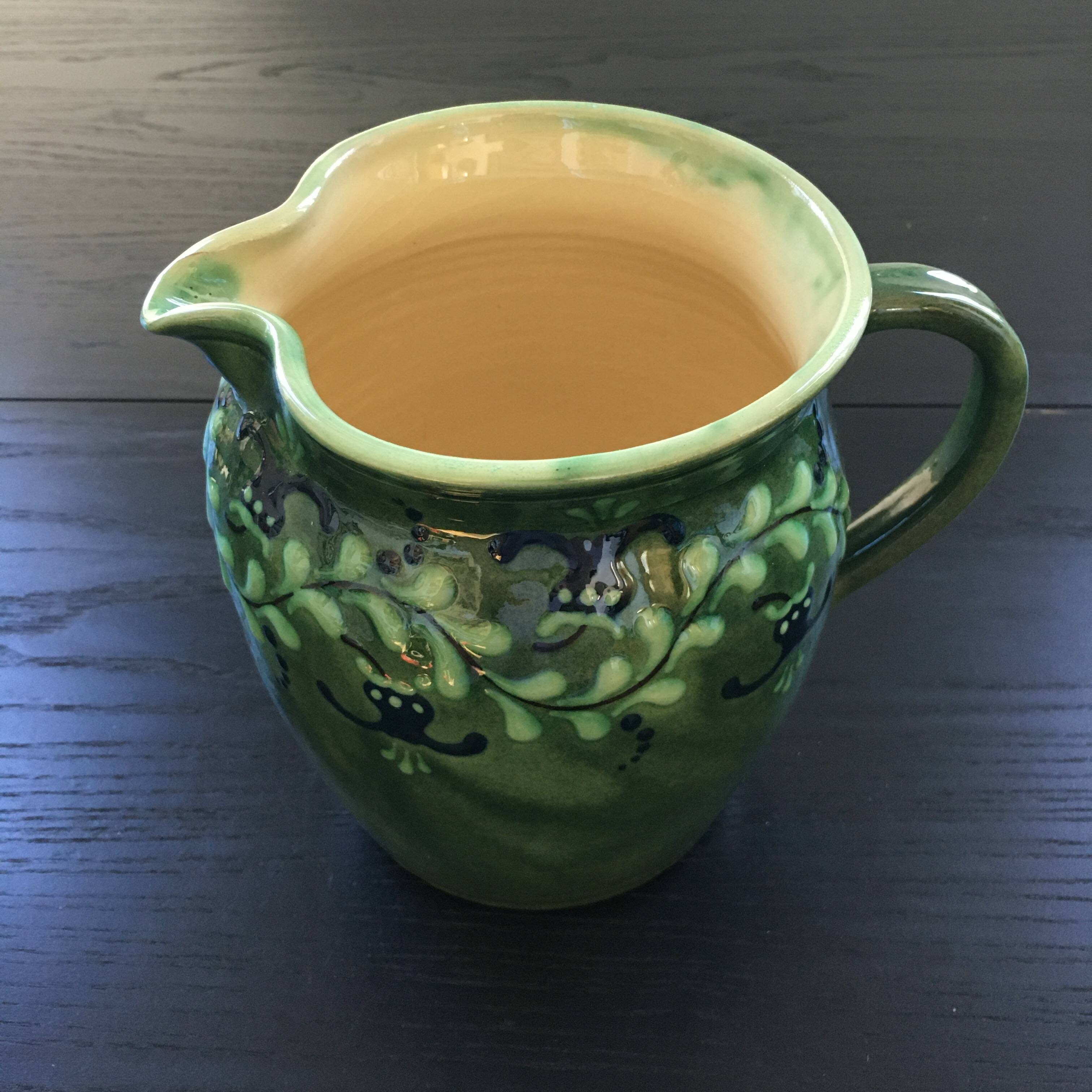 Large pitcher with floral decoration