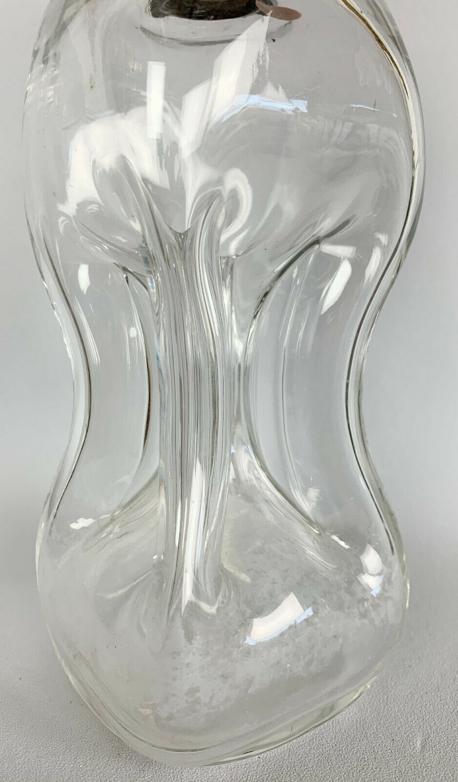 Blown glass carafe with silver frame and cap