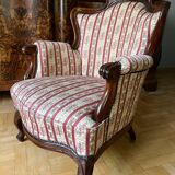 Louis Philippe style armchair with footrest from the 19th century.
