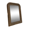 Wooden mirror and brown moldings