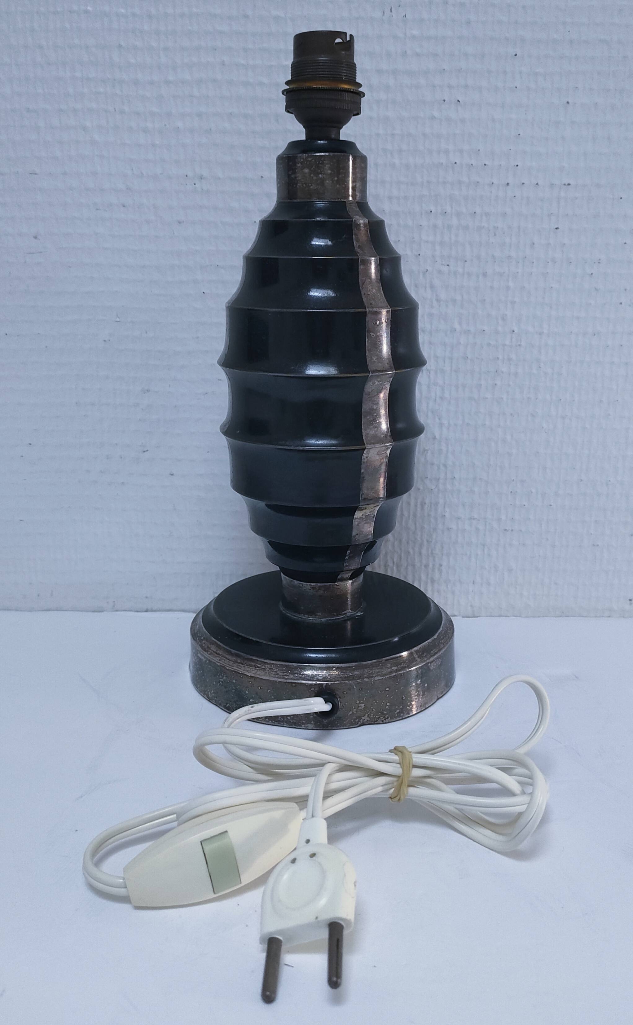 Art Deco metal lamp base with black and silver patina