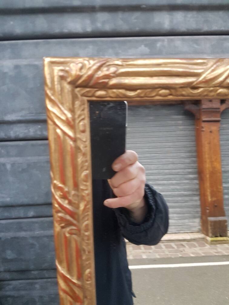 Golden mirror in louis xv style