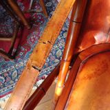 Leather folding armchair and footwork