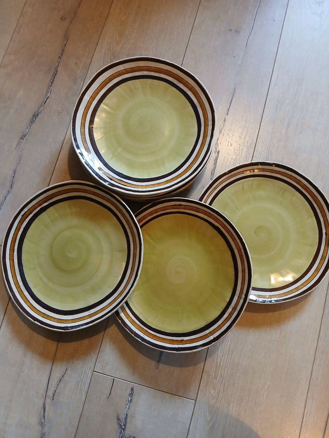7 old stoneware flat plates