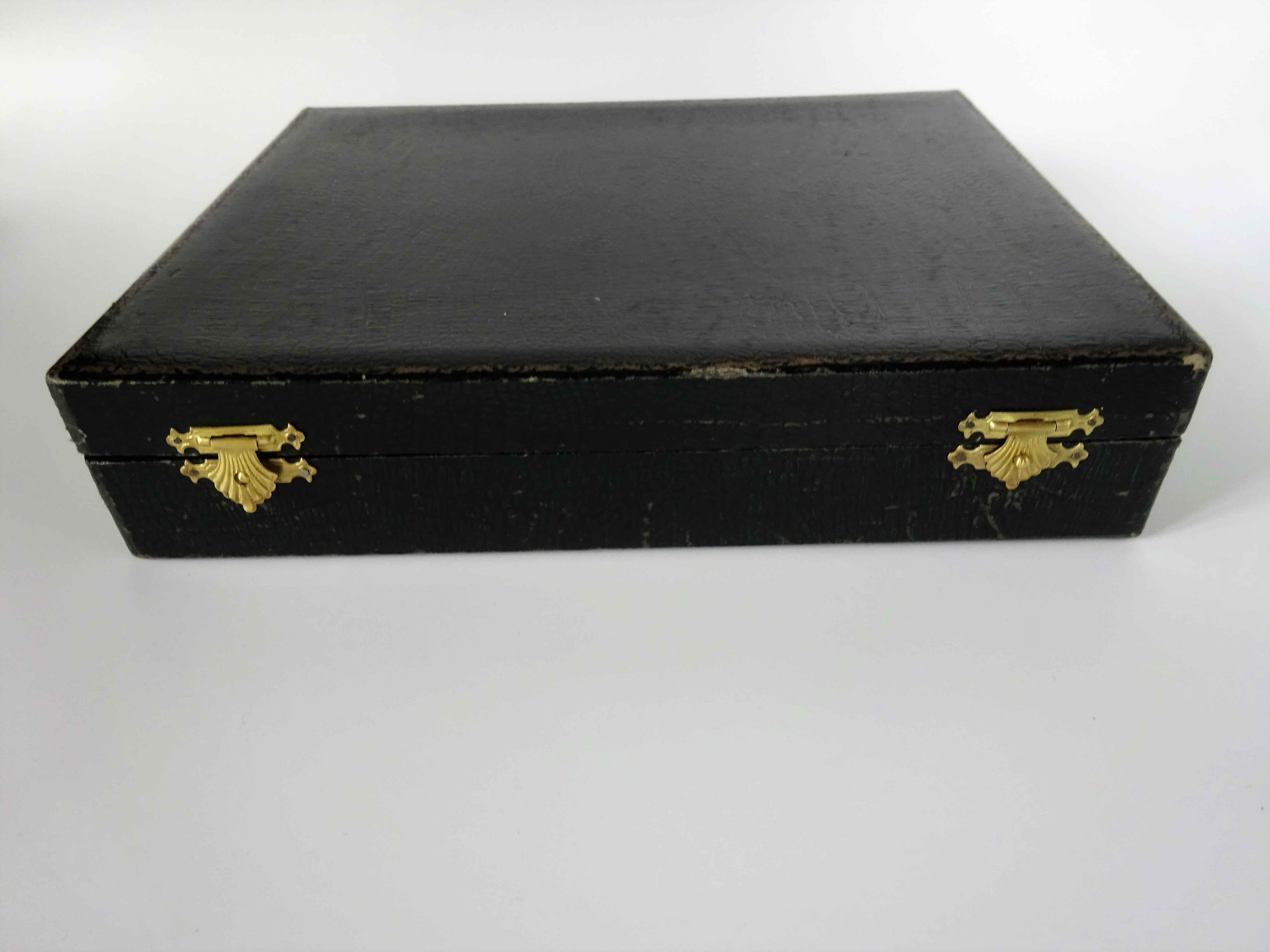 Set of 24 dessert cutlery in silver metal