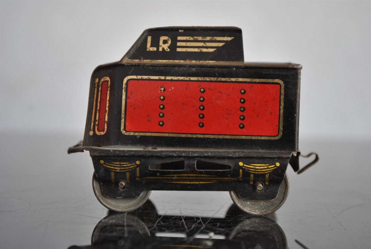 Tin litho brand LR spring-loaded toy locomotive