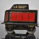 Tin litho brand LR spring-loaded toy locomotive