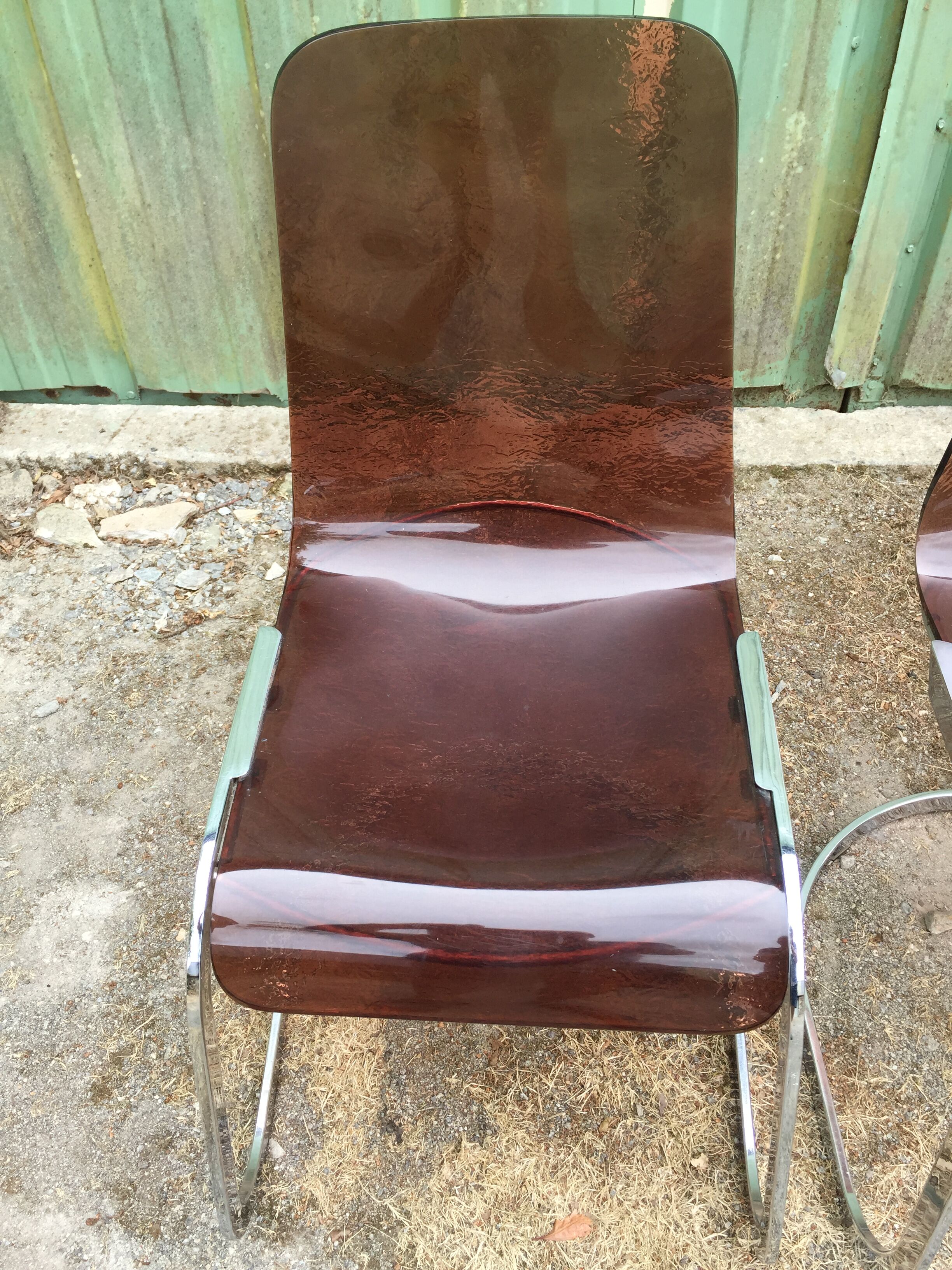 Chairs in plexiglas with chrome metal base