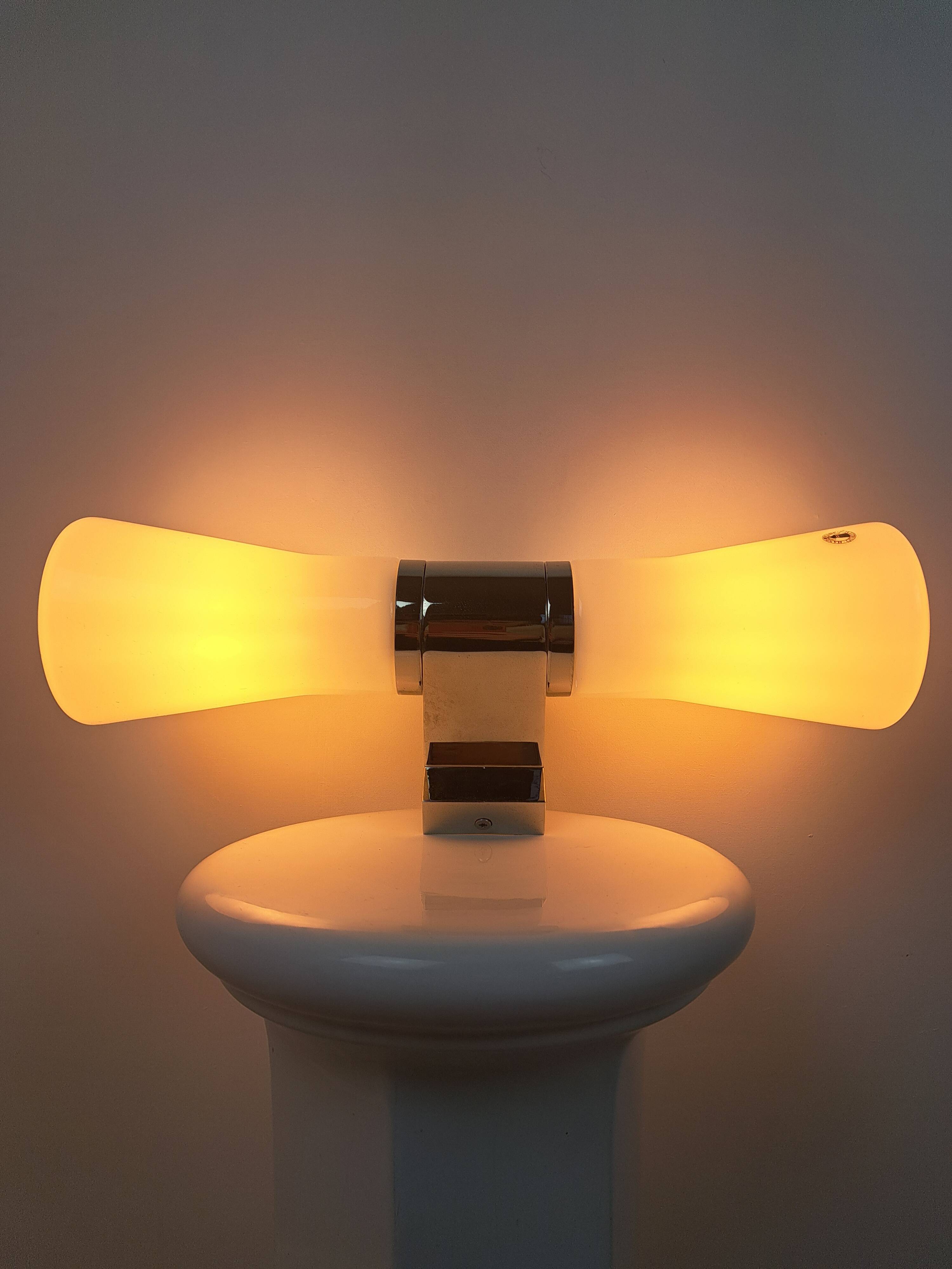 Savern space age bathroom or ambiance wall lamp in glass from Ikea