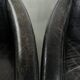 Set of two black vintage cowhide aviator design armchairs