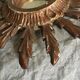 Miroir soleil en bois doré, 60