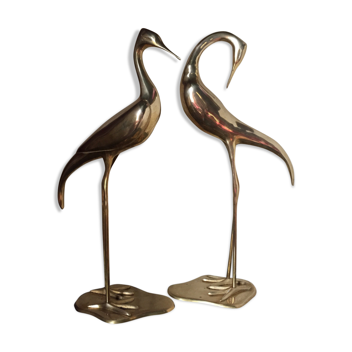 Pair of herons in brass