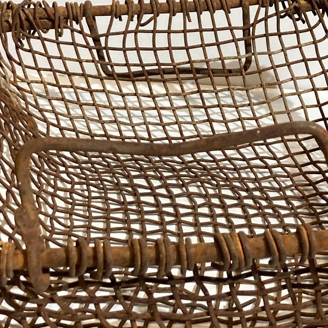 Antique woven rustic metal fireplace basket, Netherlands ca 1900