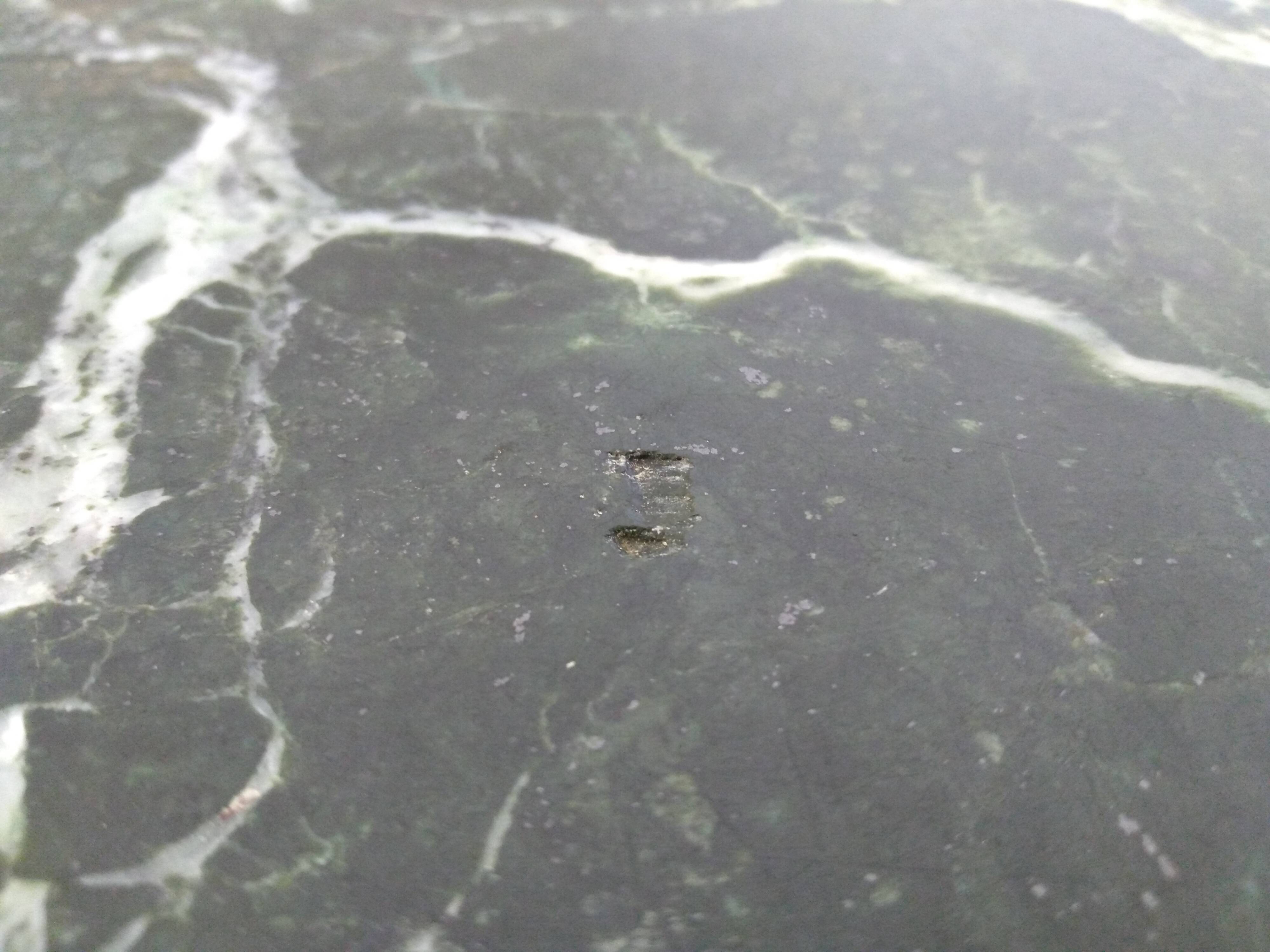 Wrought iron and marble coffee table