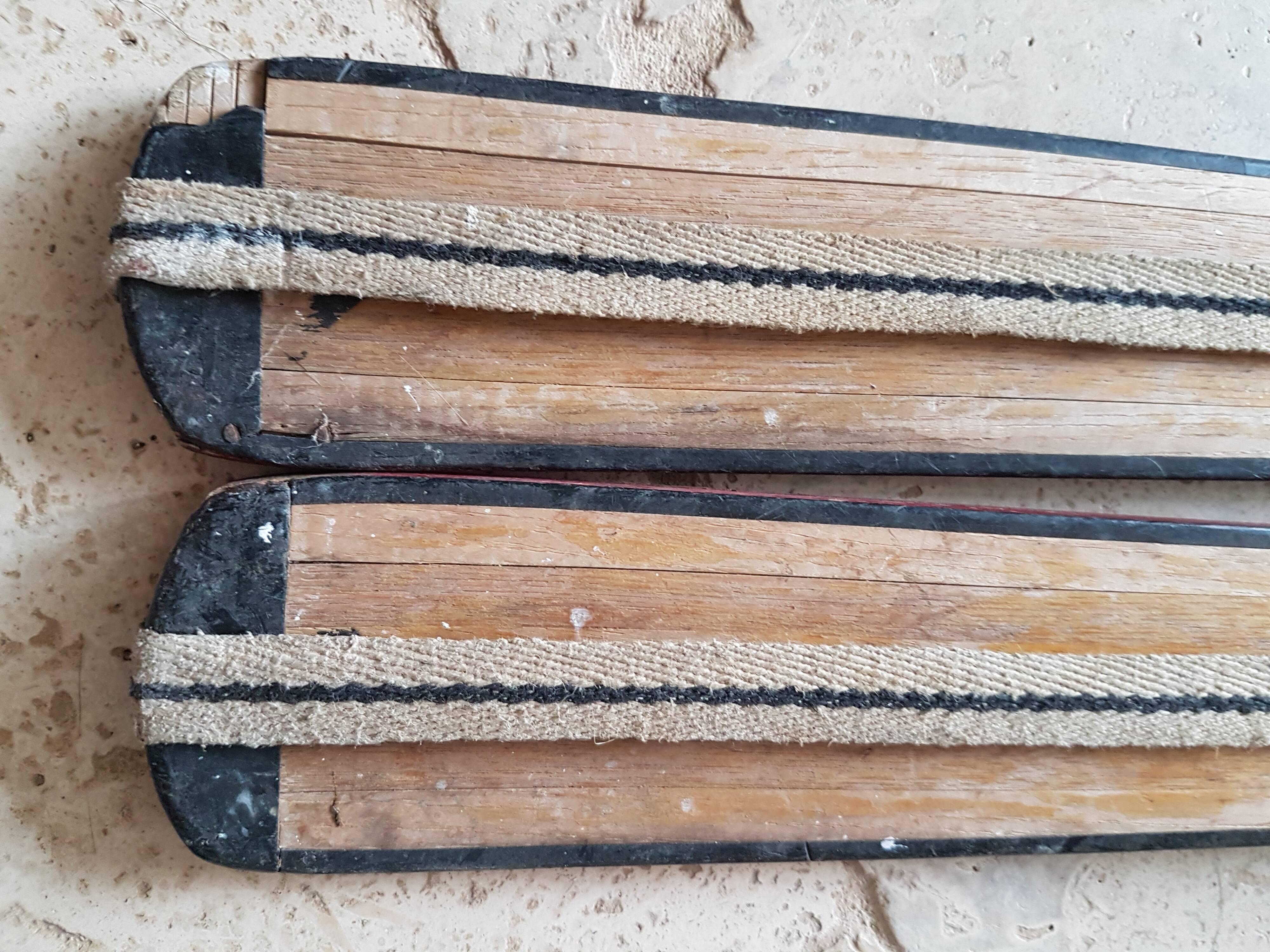 Nordic skiing in wood and skin former