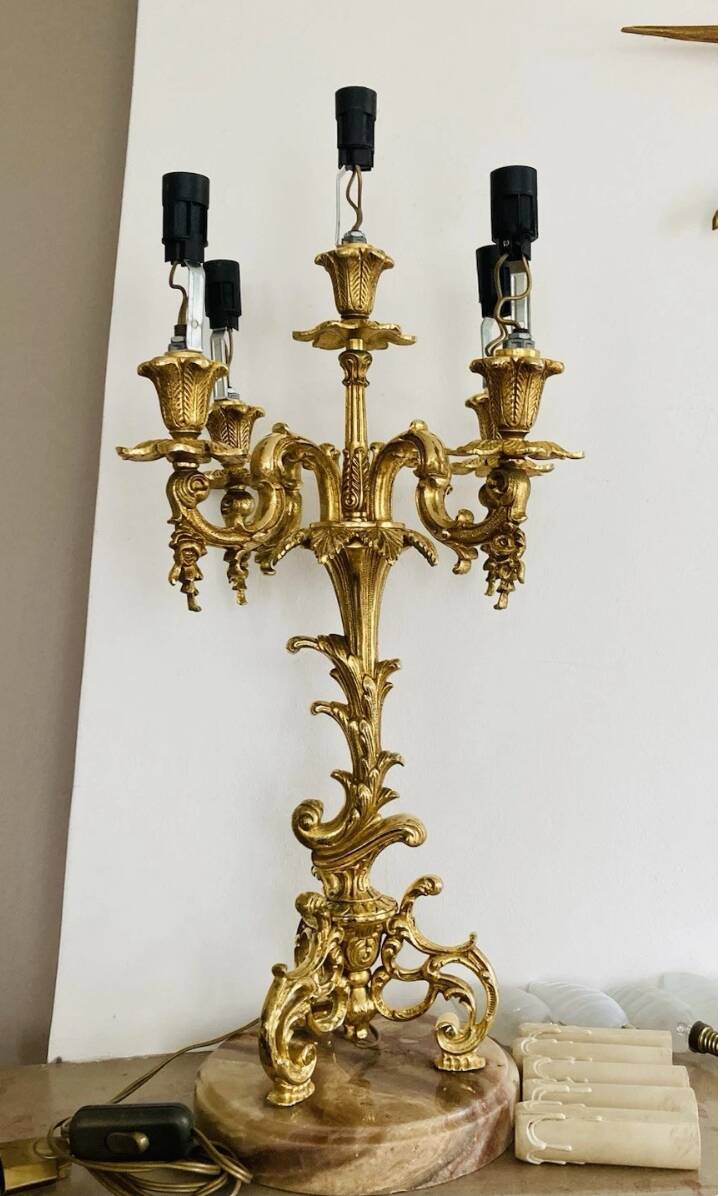 Pair of gilt bronze chandeliers, marble bases.
