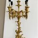 Pair of gilt bronze chandeliers, marble bases.