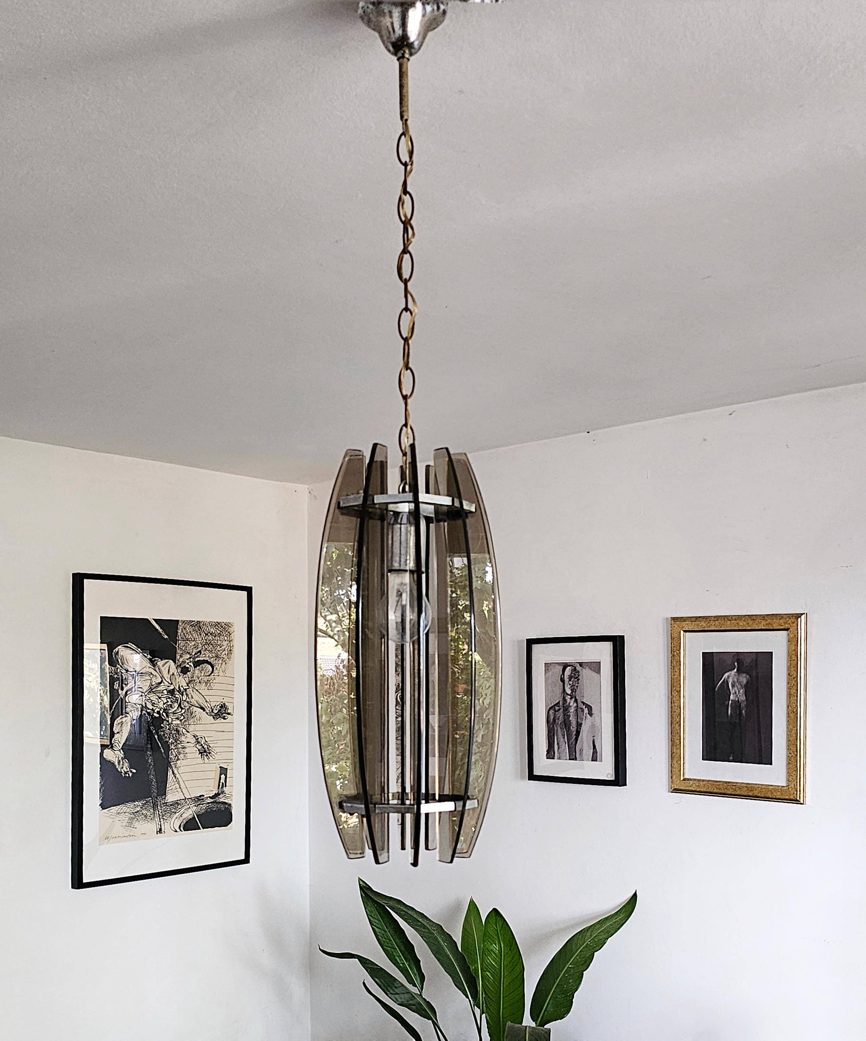 Glass chandelier, chrome and smoked glass in the Fontana Arte style from the 1970s.