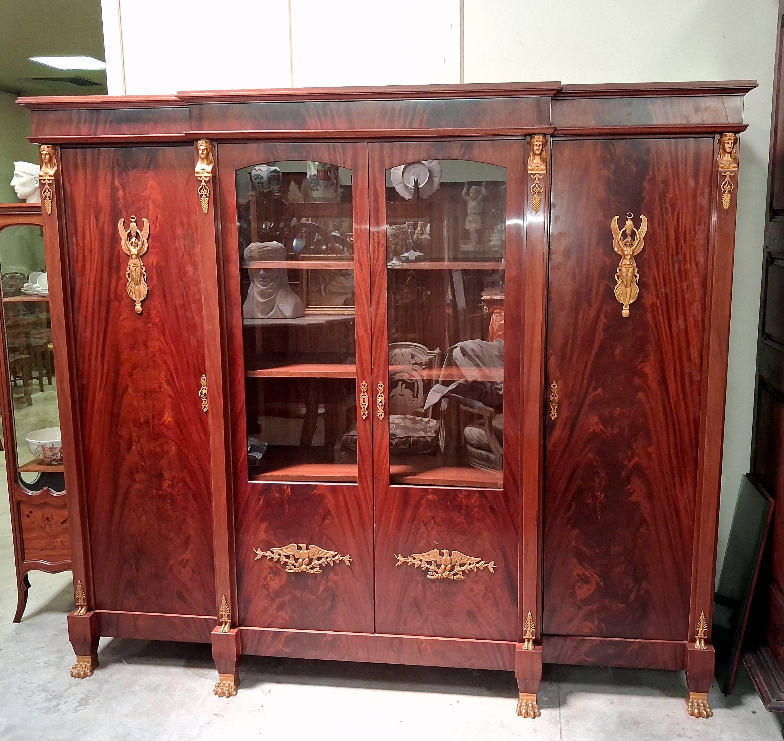 Empire-style library in flame mahogany – Gilded bronzes –
