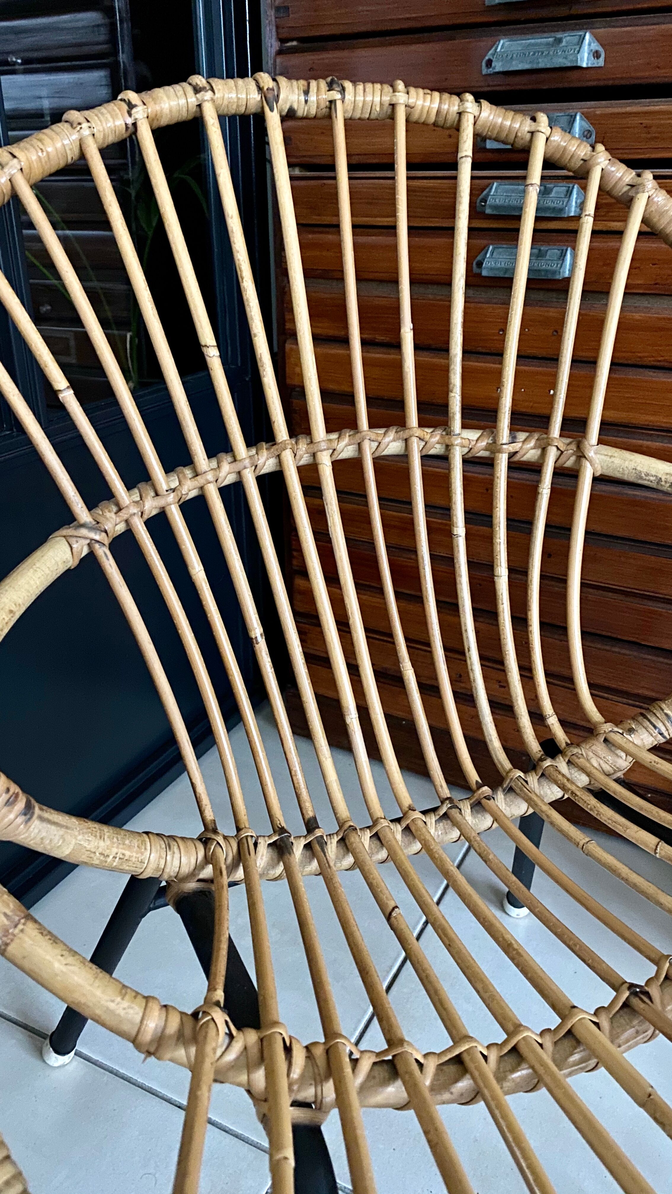 Old vintage metal foot rattan chair