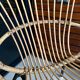 Old vintage metal foot rattan chair