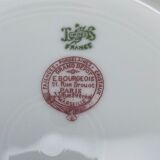 Round hollow Limoges dish with small yellow and purple flower patterns