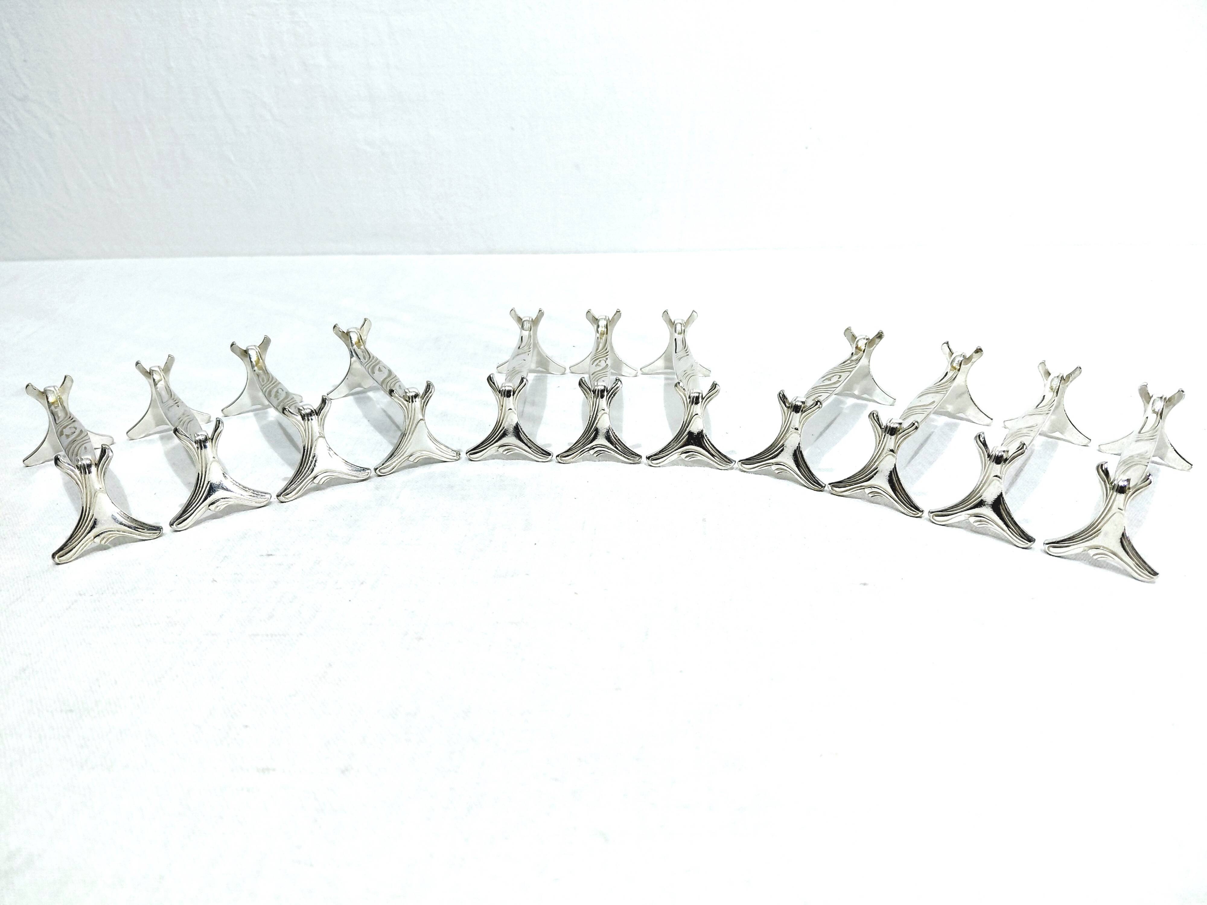 CHRISTOFLE - SET OF 11 SILVER-PLATED KNIFE RESTS