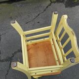 Pair of wooden and yellow formica chairs