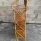 vintage rattan shelf on stand