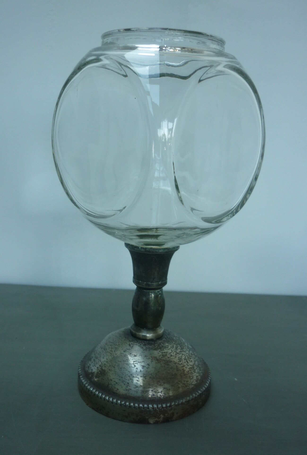 Vase or glass cup on silver stand