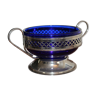 Navy blue cup on tin base