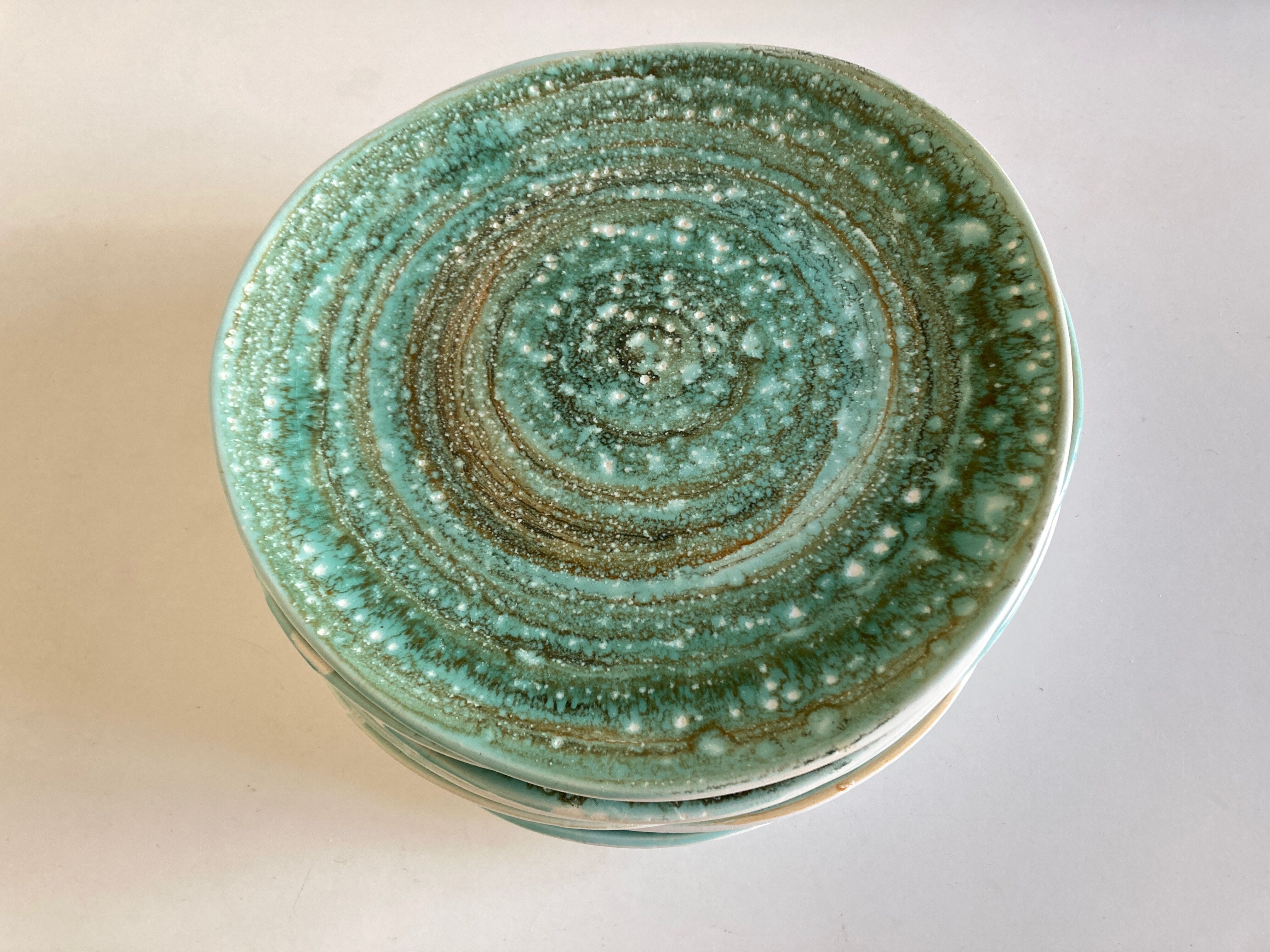 Set of 9 plates 1970 in stoneware Mousse de Nierderviller