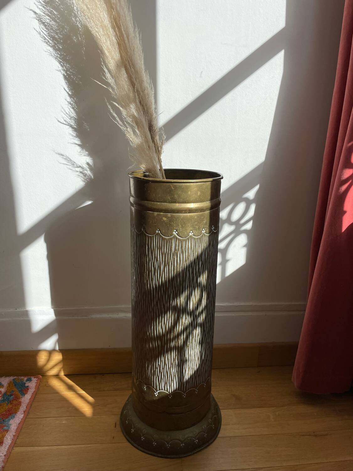 Gold metal umbrella stand