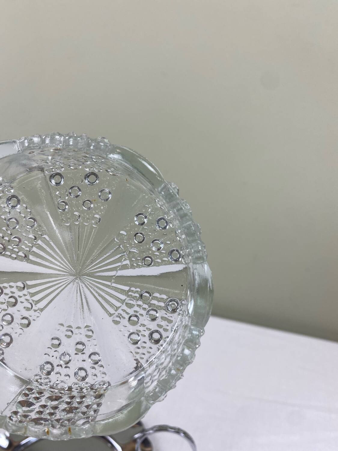 Metal and glass bowl