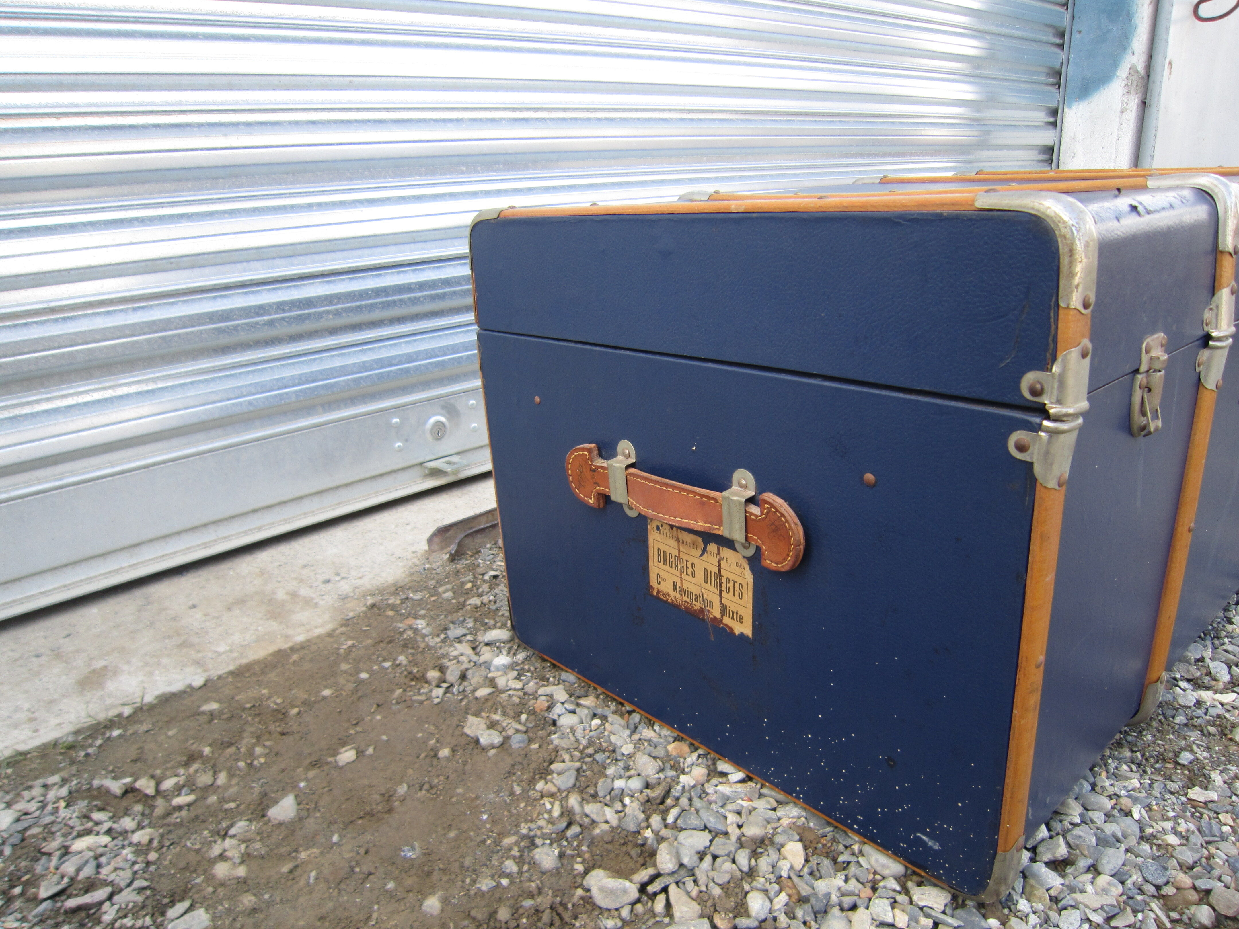 Old blue travel trunk handle leather