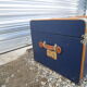 Old blue travel trunk handle leather