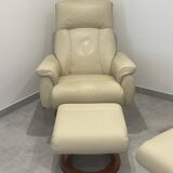 Pair of vintage leather armchairs with ottoman