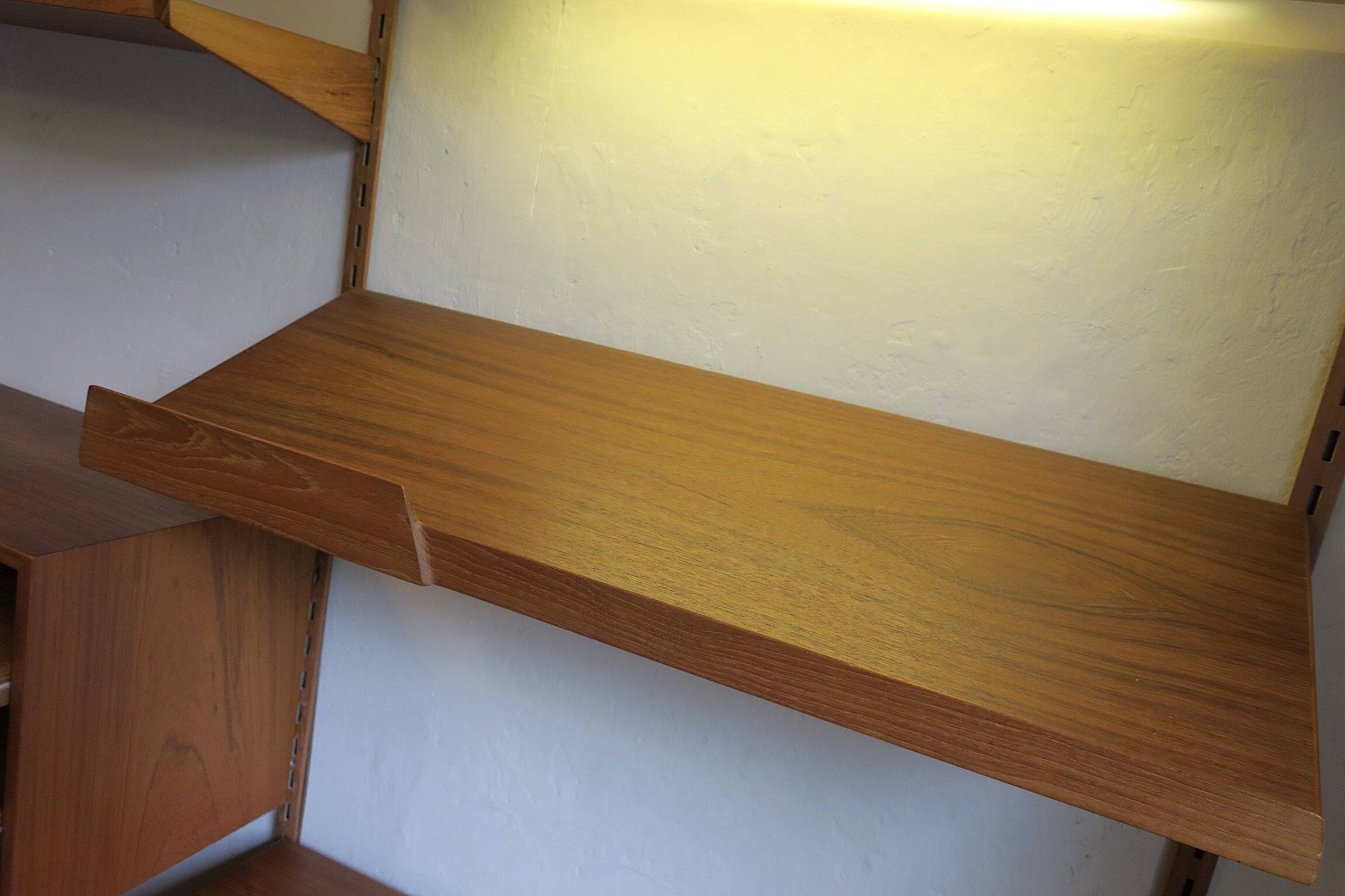 Modular 3-compartment teak wall shelving system with desk and lighting by Kai Kristiansen for FM, Denmark, 1960s