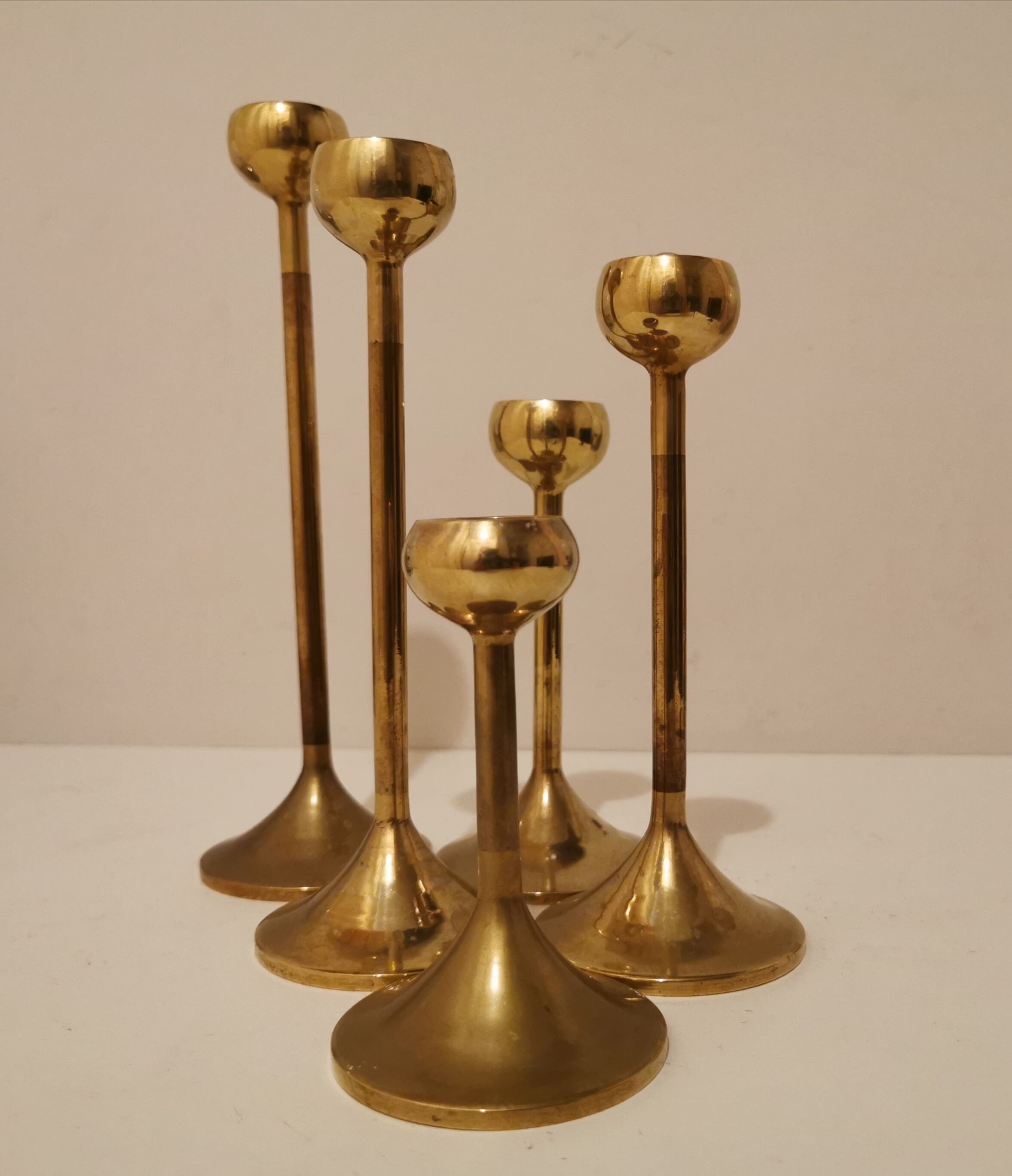 Set of 5 brass candlesticks from the 70s
