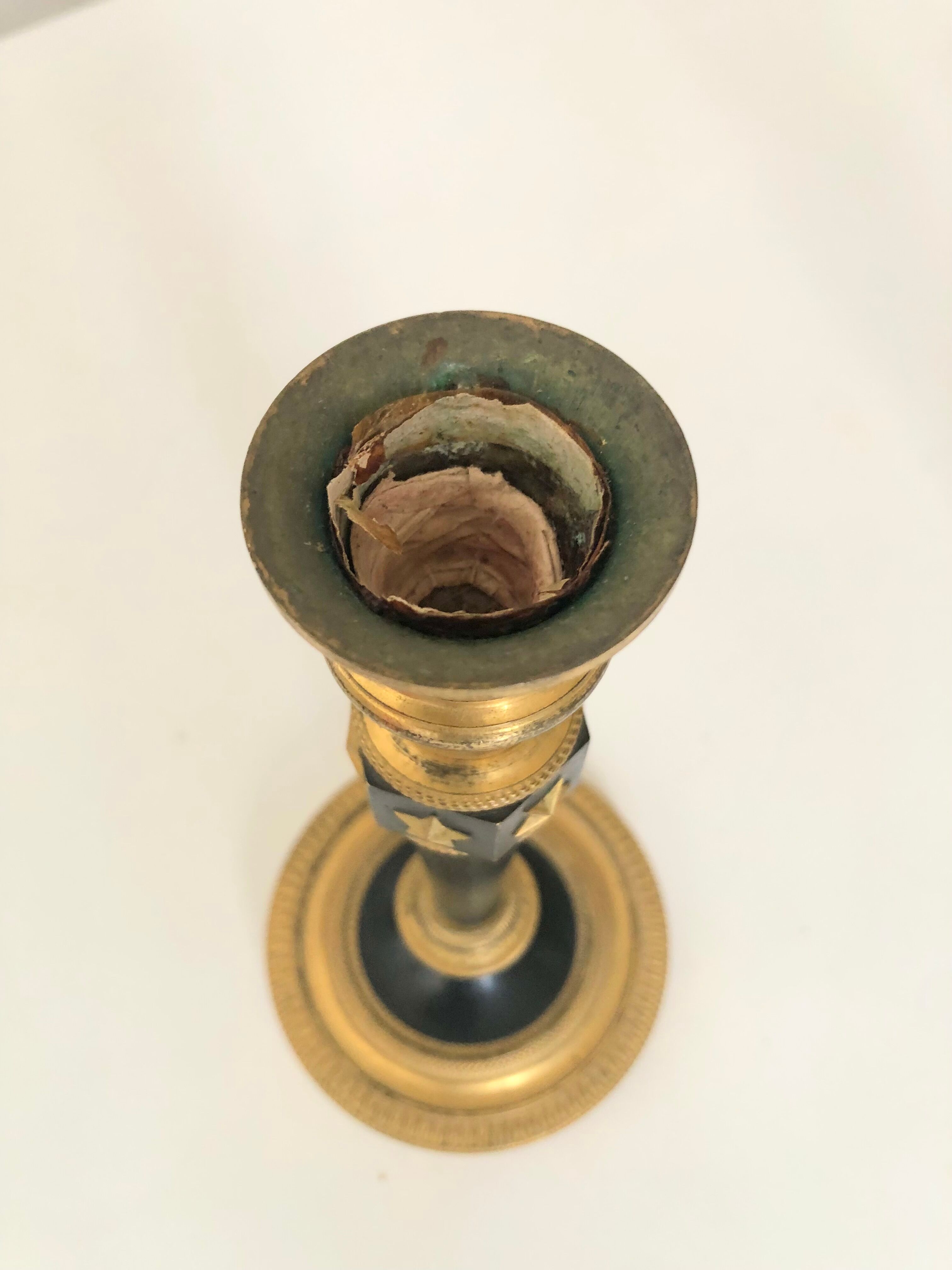 Pair of bronze candle holders empire era