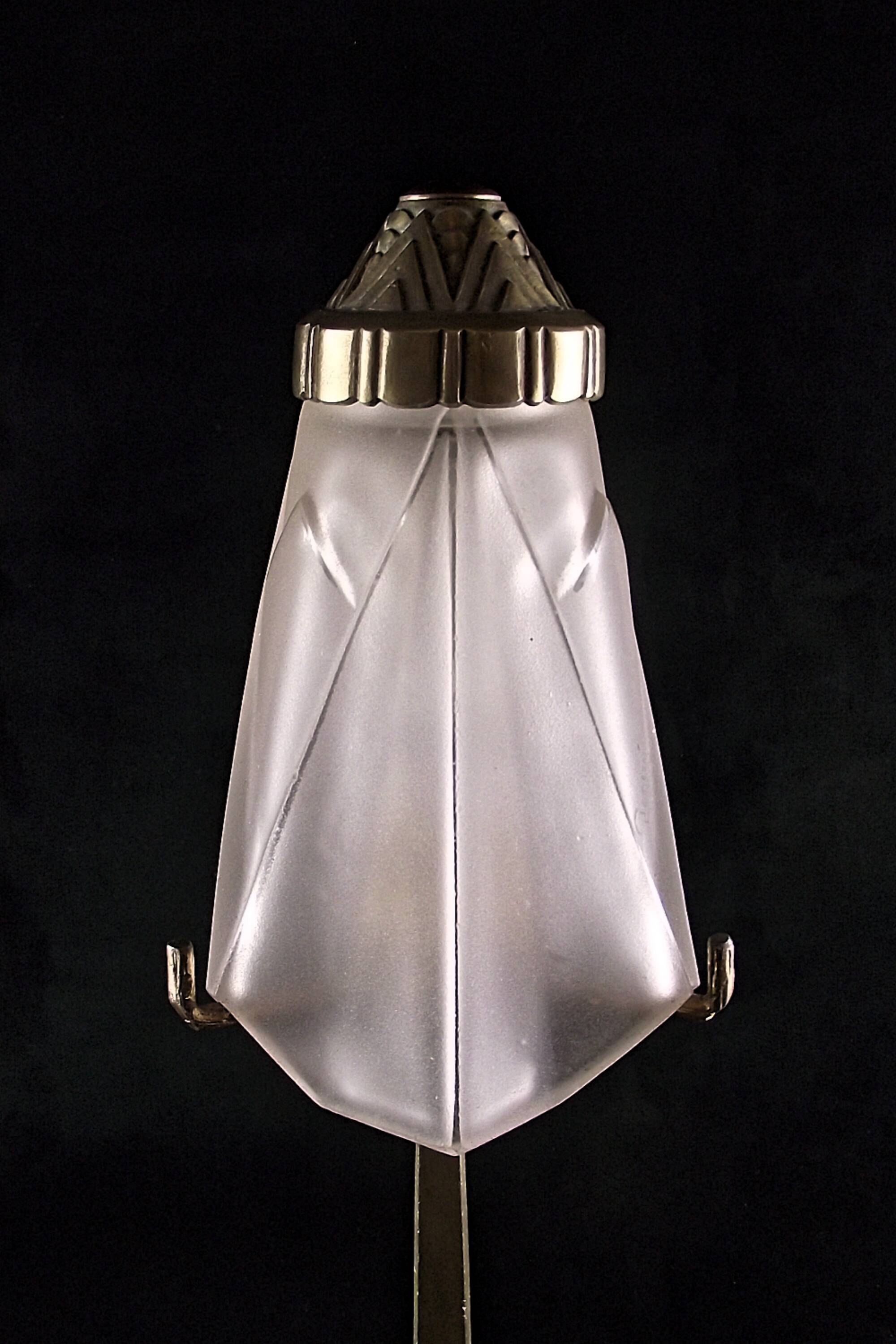 Art deco lamp signed degue with a bronze base.
