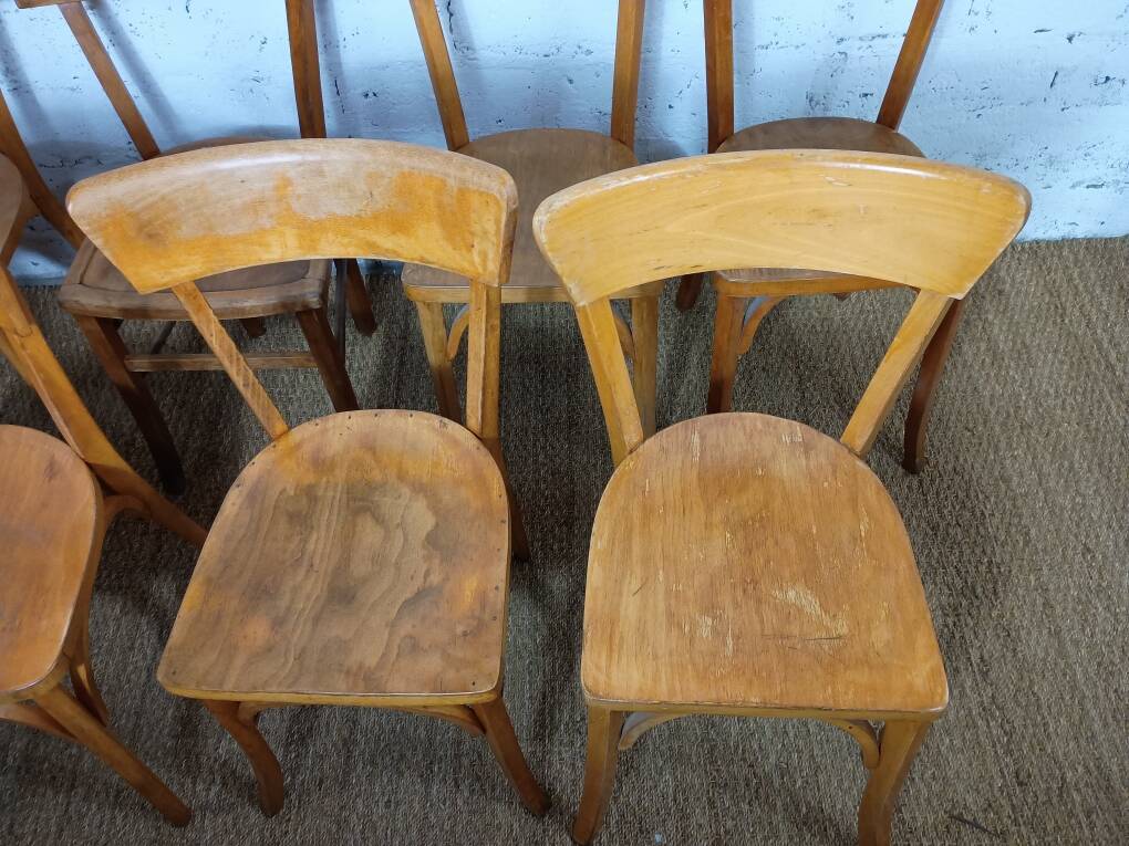 Set of 9 mismatched bistro chairs, 1950s.