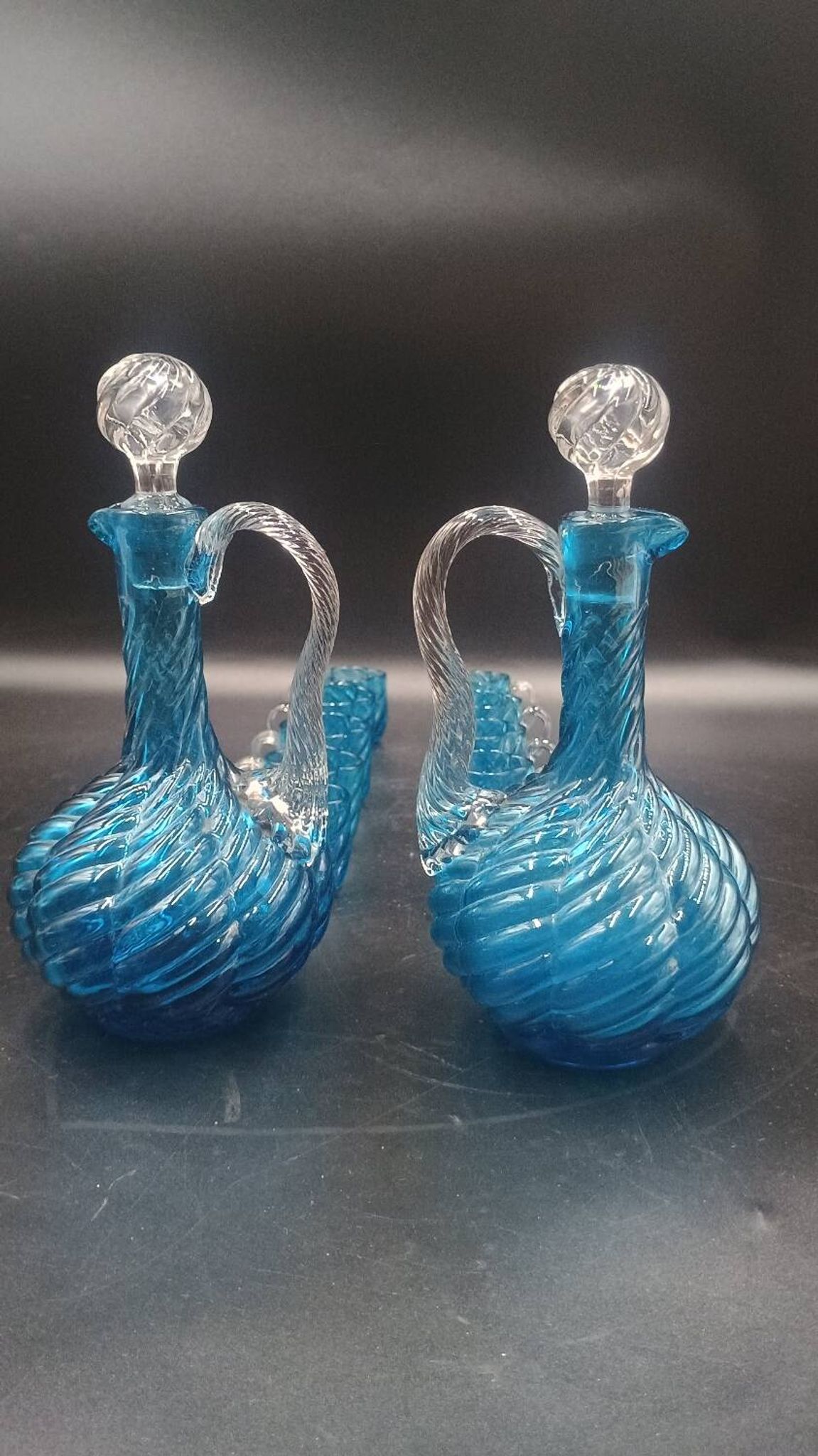 Cabaret Portieux liqueur service with 10 blue and clear glasses.