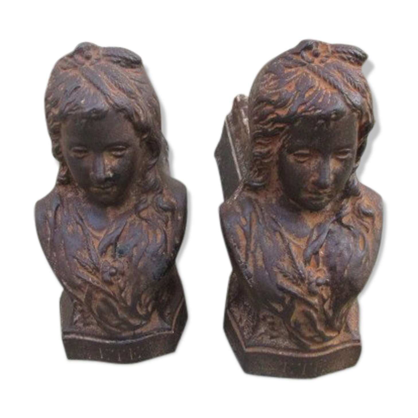 Pair of antique women's head cast iron chenets