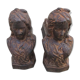 Pair of antique women's head cast iron chenets