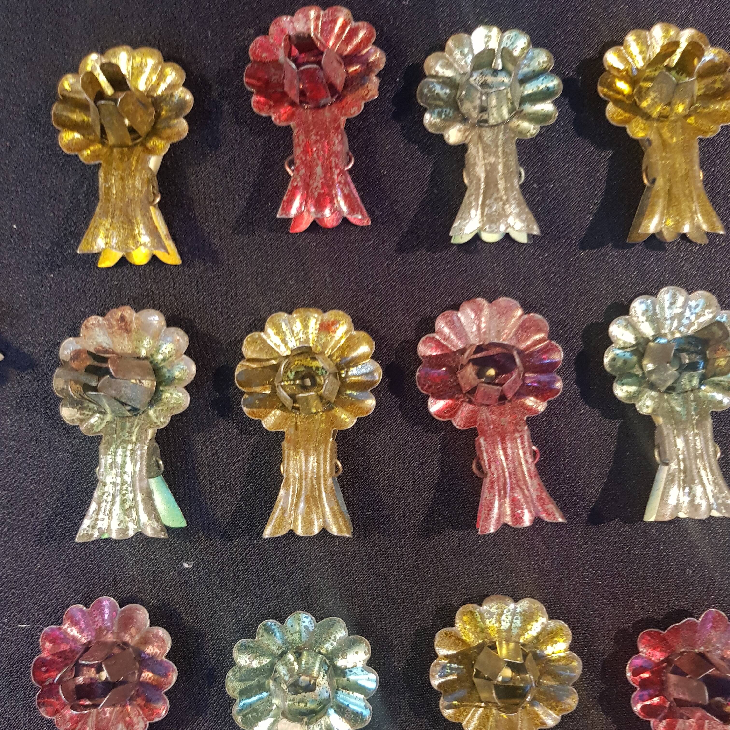 Set of 23 candle tongs