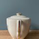 Teapot in Limoges porcelain. Charles Ahrenfeldt House